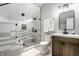 Modern bathroom featuring a glass shower, sleek fixtures, and stylish tiling at 545 Fletcher Ave, Indianapolis, IN 46203