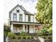 Beautiful two-story home featuring a classic design with a spacious front porch at 545 Fletcher Ave, Indianapolis, IN 46203