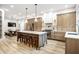 Stylish kitchen featuring an island with bar stool seating and stainless steel appliances at 545 Fletcher Ave, Indianapolis, IN 46203