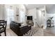 Bright living room with a comfortable sofa, TV, and stylish decor at 545 Fletcher Ave, Indianapolis, IN 46203
