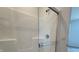 Shower unit showcasing a sleek glass door, chrome fixtures, and a built-in bench at 2170 Warbler St, Danville, IN 46122