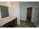 Main bathroom with double vanity, and a separate shower and closet at 3912 Highcrest Rd, Indianapolis, IN 46239