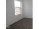 Bright bedroom with large window and neutral carpeting at 3912 Highcrest Rd, Indianapolis, IN 46239