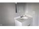 Bathroom with single sink vanity and mirror at 424 N Kealing Ave, Indianapolis, IN 46201