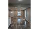 Bright living room featuring new floors and large windows at 424 N Kealing Ave, Indianapolis, IN 46201