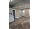 Open living room with new floors, recessed lighting, and neutral paint at 424 N Kealing Ave, Indianapolis, IN 46201