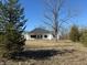 Exterior of home showing large backyard with clear blue sky at 5143 Oak Ridge Pl, Columbus, IN 47201