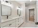Bathroom with double vanity, quartz countertops, and sleek black hardware at 5143 Oak Ridge Pl, Columbus, IN 47201