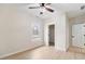 Bedroom featuring natural light, wood-look flooring, and an open closet at 5143 Oak Ridge Pl, Columbus, IN 47201