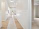 Entryway featuring wood-look flooring, paneled walls, and a modern rug at 5143 Oak Ridge Pl, Columbus, IN 47201