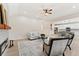 Cozy living area featuring a modern fireplace, plush seating, and an open layout connecting to the kitchen at 5143 Oak Ridge Pl, Columbus, IN 47201
