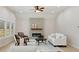 Inviting living room with a contemporary fireplace, comfortable seating, and warm natural light for a relaxing ambiance at 5143 Oak Ridge Pl, Columbus, IN 47201