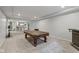 Finished basement featuring plush carpeting, recessed lighting, and a pool table area with bar seating at 10346 Strongbow Rd, Fishers, IN 46040