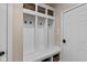 Mudroom features built-in storage with baskets and hooks at 10346 Strongbow Rd, Fishers, IN 46040