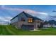 Two story home with stone exterior, deck and hot tub at 1372 N Stoney Brook, Greenfield, IN 46140