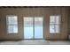 Unfinished basement with three windows and sliding glass doors at 1372 N Stoney Brook, Greenfield, IN 46140