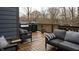 Entertain on this deck complete with grill, seating, and a view of the backyard at 1372 N Stoney Brook, Greenfield, IN 46140