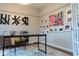 Bright home office featuring a desk, gallery wall, and stylish rug at 1372 N Stoney Brook, Greenfield, IN 46140