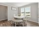 Charming dining room features a round table, bench seating, and a homey atmosphere at 16341 Drayton Way, Fortville, IN 46040