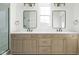 Double vanity bathroom with frameless shower and mirrors at 1667 Midland Main St, Westfield, IN 46074