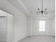 Spacious bedroom with large window and carpeting at 1667 Midland Main St, Westfield, IN 46074