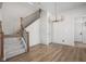 Bright dining room with hardwood floors and chandelier at 1667 Midland Main St, Westfield, IN 46074