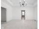Main bedroom with access to bathroom and a chandelier at 1667 Midland Main St, Westfield, IN 46074