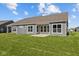 The home's exterior is complemented by a spacious backyard, perfect for outdoor gatherings and activities at 16946 Cattle Hollow Ln, Noblesville, IN 46060