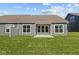 Expansive backyard view, featuring a patio and verdant lawn for leisure and entertaining at 16946 Cattle Hollow Ln, Noblesville, IN 46060