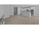 Spacious living room features wood floors and an open layout to the kitchen at 16946 Cattle Hollow Ln, Noblesville, IN 46060