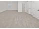 Large finished basement featuring neutral walls, plush carpeting, and access to a bathroom at 19566 Wood Farm Pl, Westfield, IN 46074