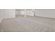 Spacious basement with neutral walls and floors and a staircase to the upper level at 19566 Wood Farm Pl, Westfield, IN 46074