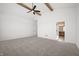 Spacious carpeted bedroom with vaulted ceilings, wood beams, and natural light at 19566 Wood Farm Pl, Westfield, IN 46074