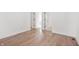 Hallway featuring wood floors and white trim at 19566 Wood Farm Pl, Westfield, IN 46074