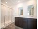 Modern bathroom showcasing double vanity with a marble shower at 248 Highland Ave, Danville, IN 46122