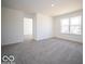Well lit carpeted bedroom with natural light shining from the window at 248 Highland Ave, Danville, IN 46122