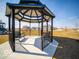 Community gazebo featuring metal frame and seating with a view of neighborhood homes at 248 Highland Ave, Danville, IN 46122