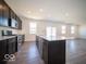 Eat-in kitchen with stainless steel appliances and abundant cabinet space at 248 Highland Ave, Danville, IN 46122