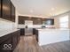 Gourmet kitchen featuring large island, stainless steel appliances, and ample counter space at 248 Highland Ave, Danville, IN 46122
