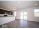 Spacious kitchen with stainless steel appliances and sliding glass door access to the backyard at 248 Highland Ave, Danville, IN 46122