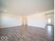 Bright open concept living room with plenty of space and recessed lighting at 248 Highland Ave, Danville, IN 46122