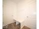 Mudroom features storage bench and hooks for organization at 248 Highland Ave, Danville, IN 46122