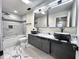 Modern bathroom with marble accents and a double vanity at 3271 Winthrop Ave, Indianapolis, IN 46205