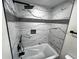 Modern bathroom featuring a marble shower and bathtub at 3271 Winthrop Ave, Indianapolis, IN 46205