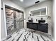 Contemporary bathroom with marble shower and double vanity at 3271 Winthrop Ave, Indianapolis, IN 46205