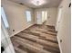 Simple bedroom with hardwood floors and neutral walls at 3271 Winthrop Ave, Indianapolis, IN 46205