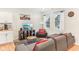 Stylish living room features wood floors, large windows, and modern furnishings at 359 Terrace Ave, Indianapolis, IN 46225