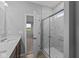 Bathroom with double vanity, marble shower, and a view of bedroom at 3950 Bozeman Way, Bargersville, IN 46106