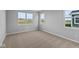 Well-lit bedroom with neutral carpeting and large windows at 3950 Bozeman Way, Bargersville, IN 46106