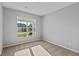 Sunlit bedroom with large window and neutral decor at 3950 Bozeman Way, Bargersville, IN 46106